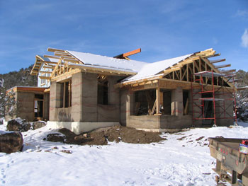 rammed earth home under construction