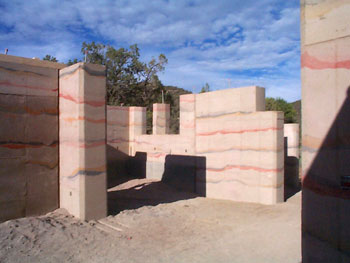 sculptural rammed earth walls