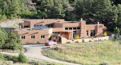 passive solar double adobe home with mid wall insulation