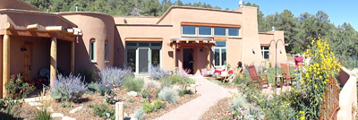 sustainable double adobe home with mid wall insulation