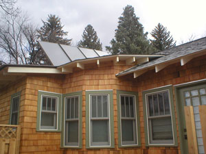 solar hot water collectors on craftsman style home